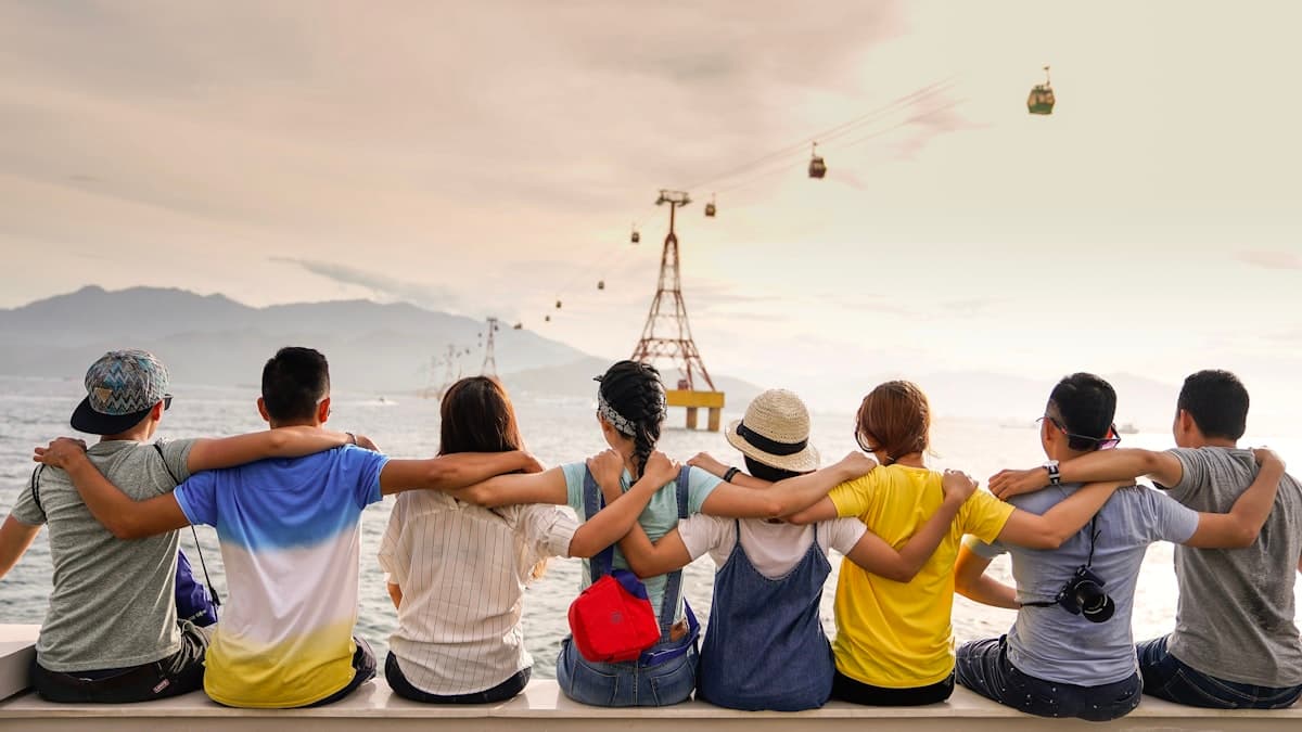 Group of friends laughing together outdoors